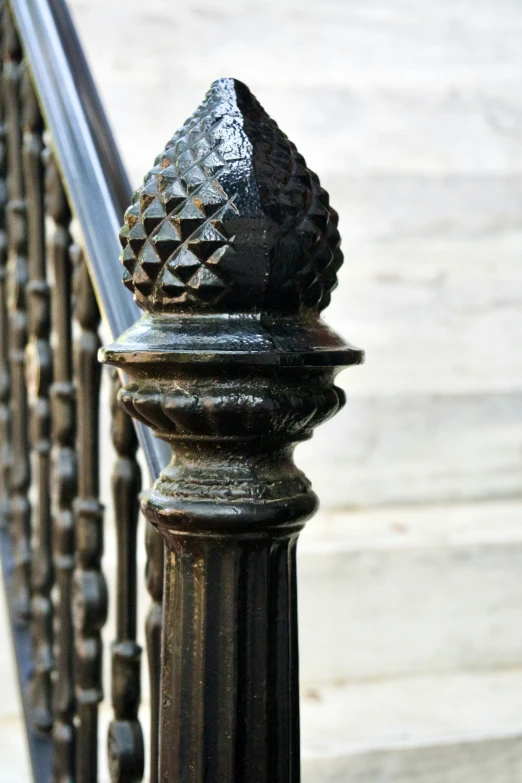 an iron fence and some steps