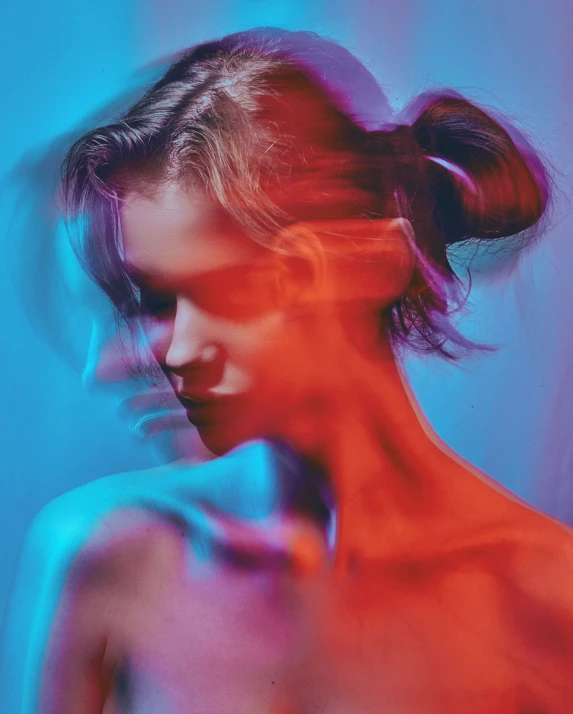 an abstract image of a woman with messy hair and a top knot