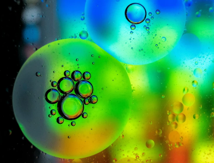 close up of oil bubbles in water