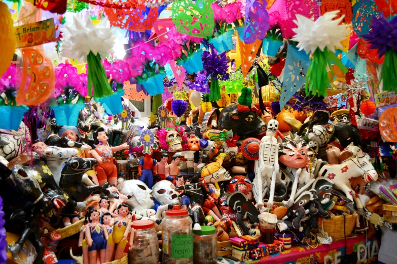 a store with lots of colorful toys hanging