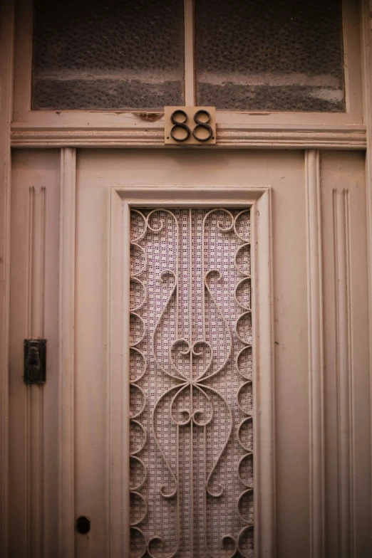 door with numbers and design on the front