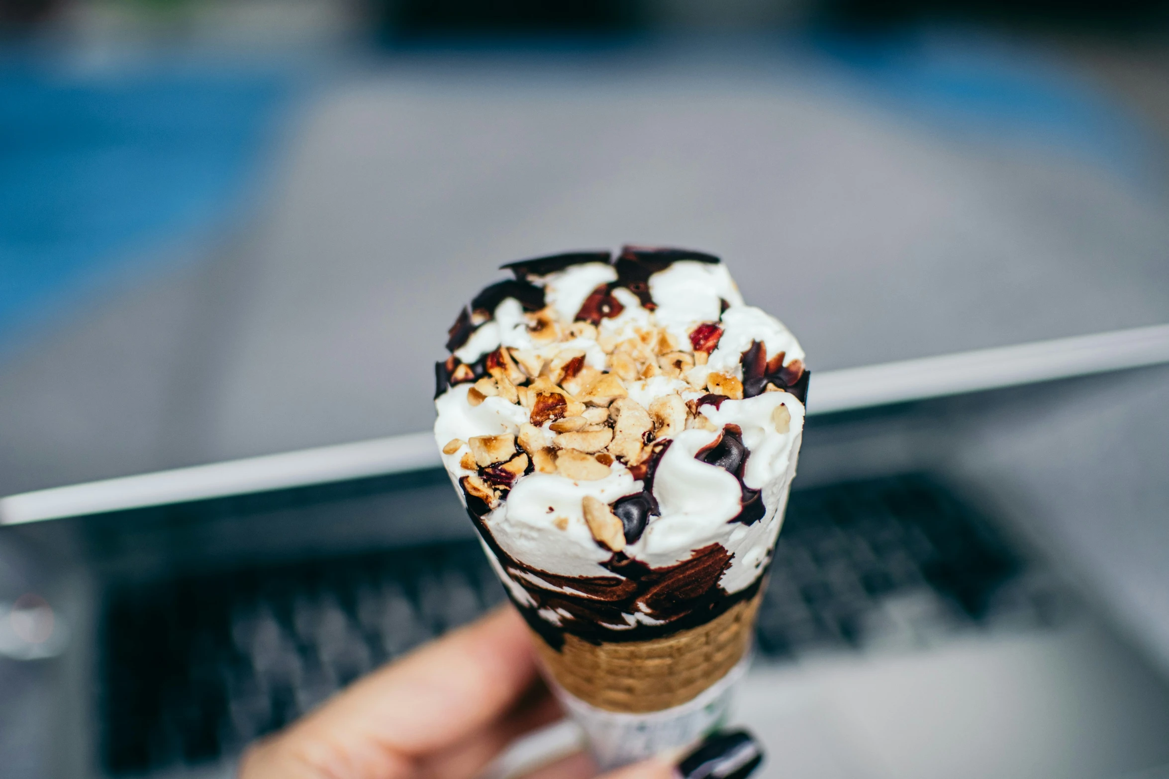 a person is eating an ice cream sundae