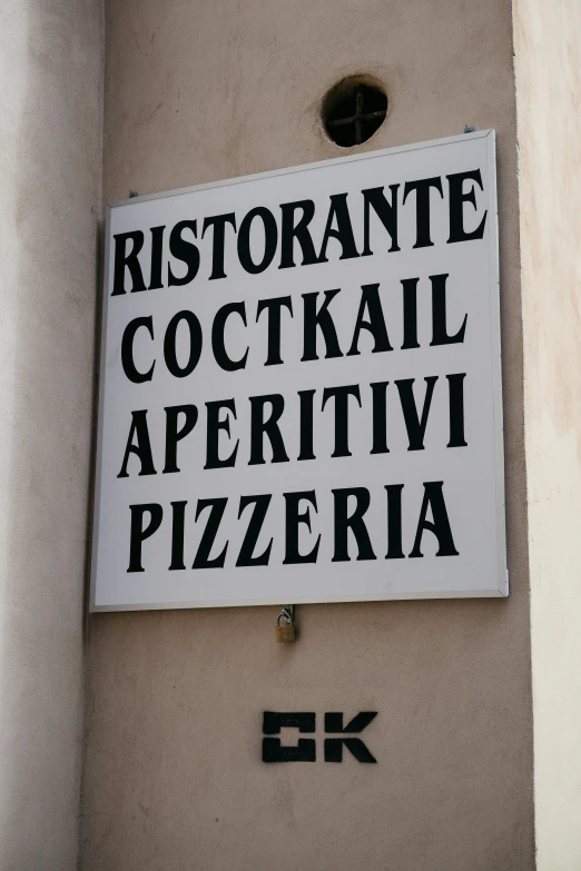 a sign on the side of a building reads bistroante cocktail appetivi pizza