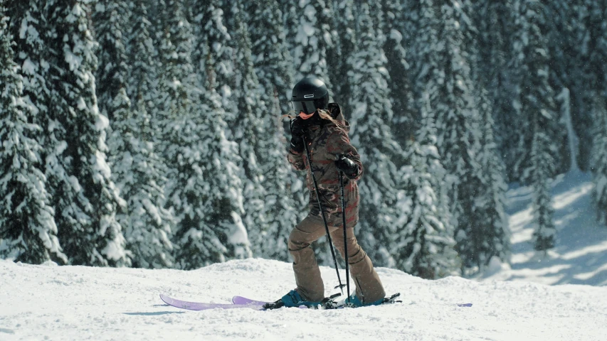 a skier in full gear on a ski slope