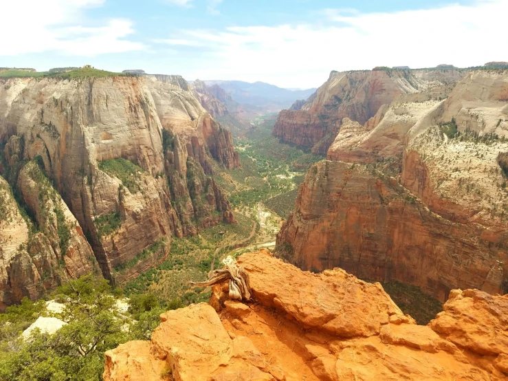 a view of some mountains in the distance from a high viewpoint