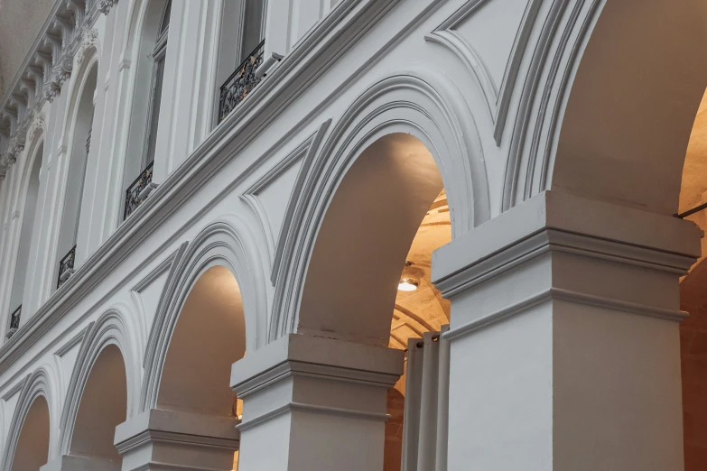 looking up at the arched architecture of a building