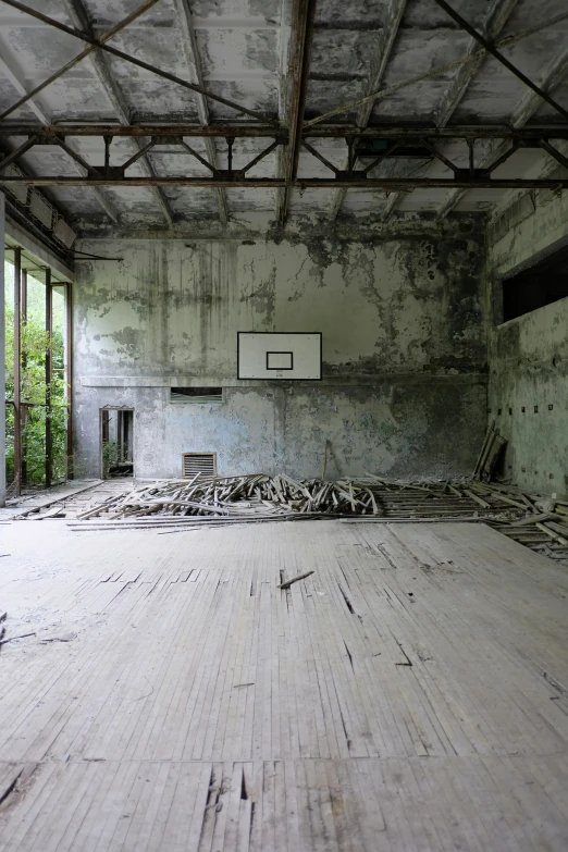 a room with white paint and exposed wood