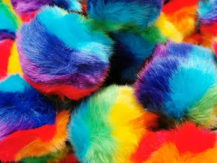 a close up image of colorful yarn