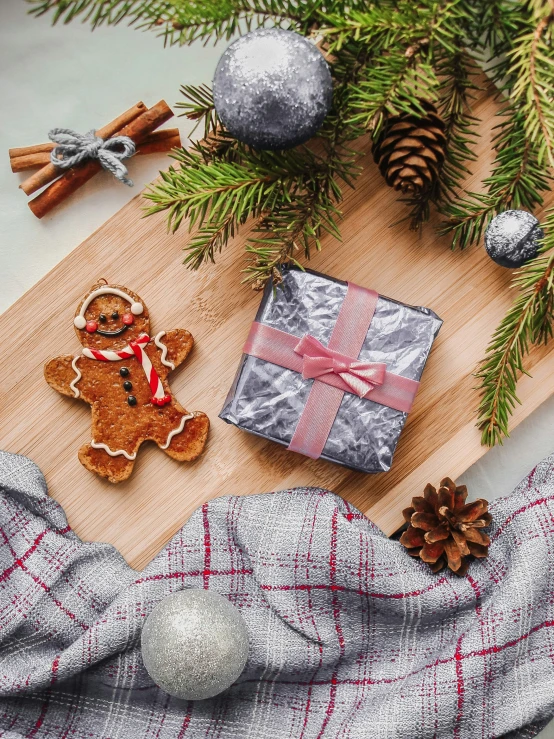 two presents that are being decorated on a  board