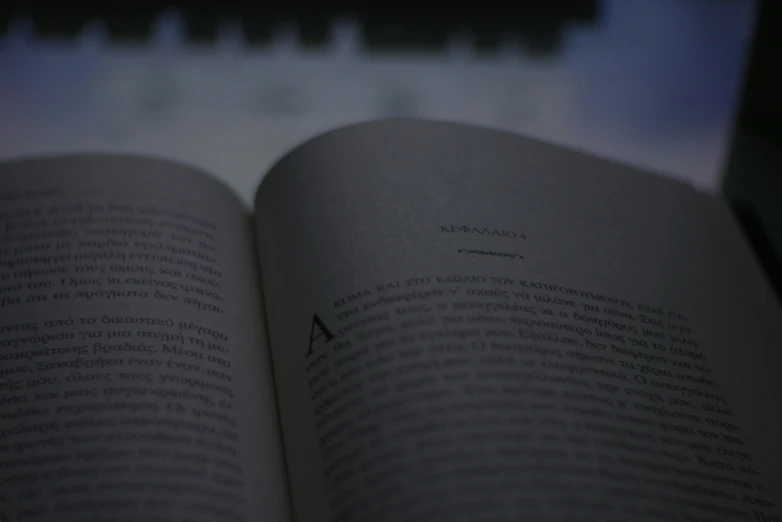 an open book on a black table top