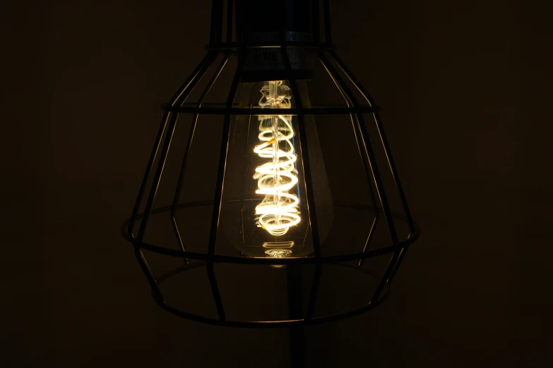 a light bulb lit up at night with many lights in it