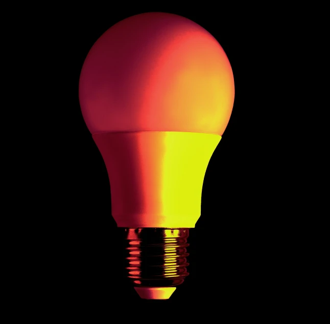 a light bulb with yellow light is shown