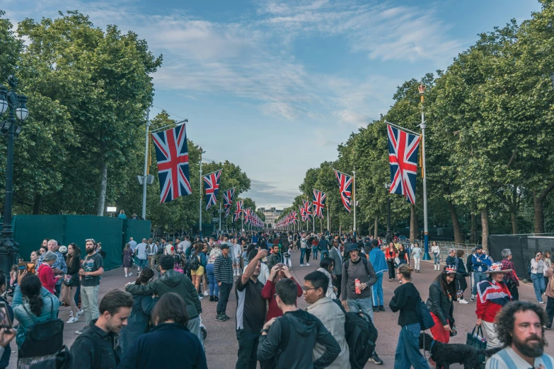 a group of people with union flags flying from them