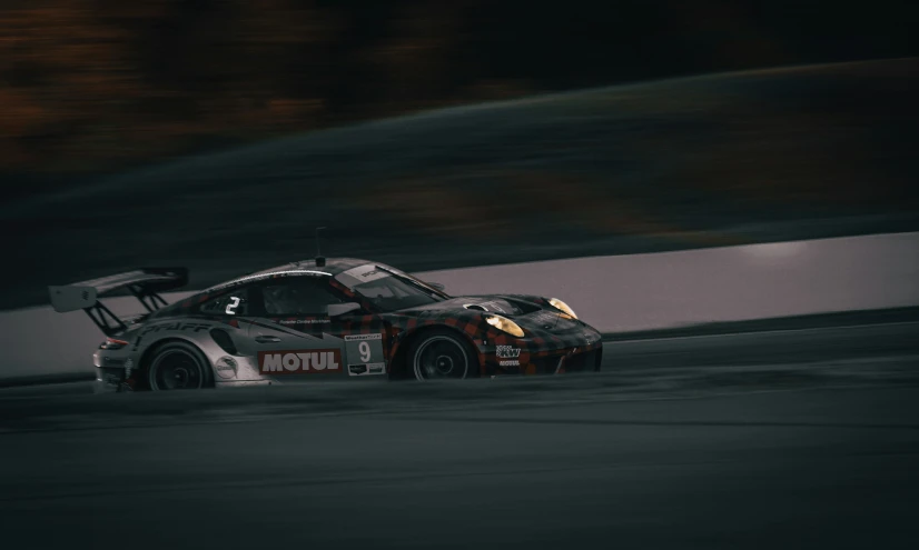 a car on a track with blurry background