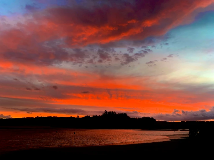 the sky is getting ready to be colored with pink and blue