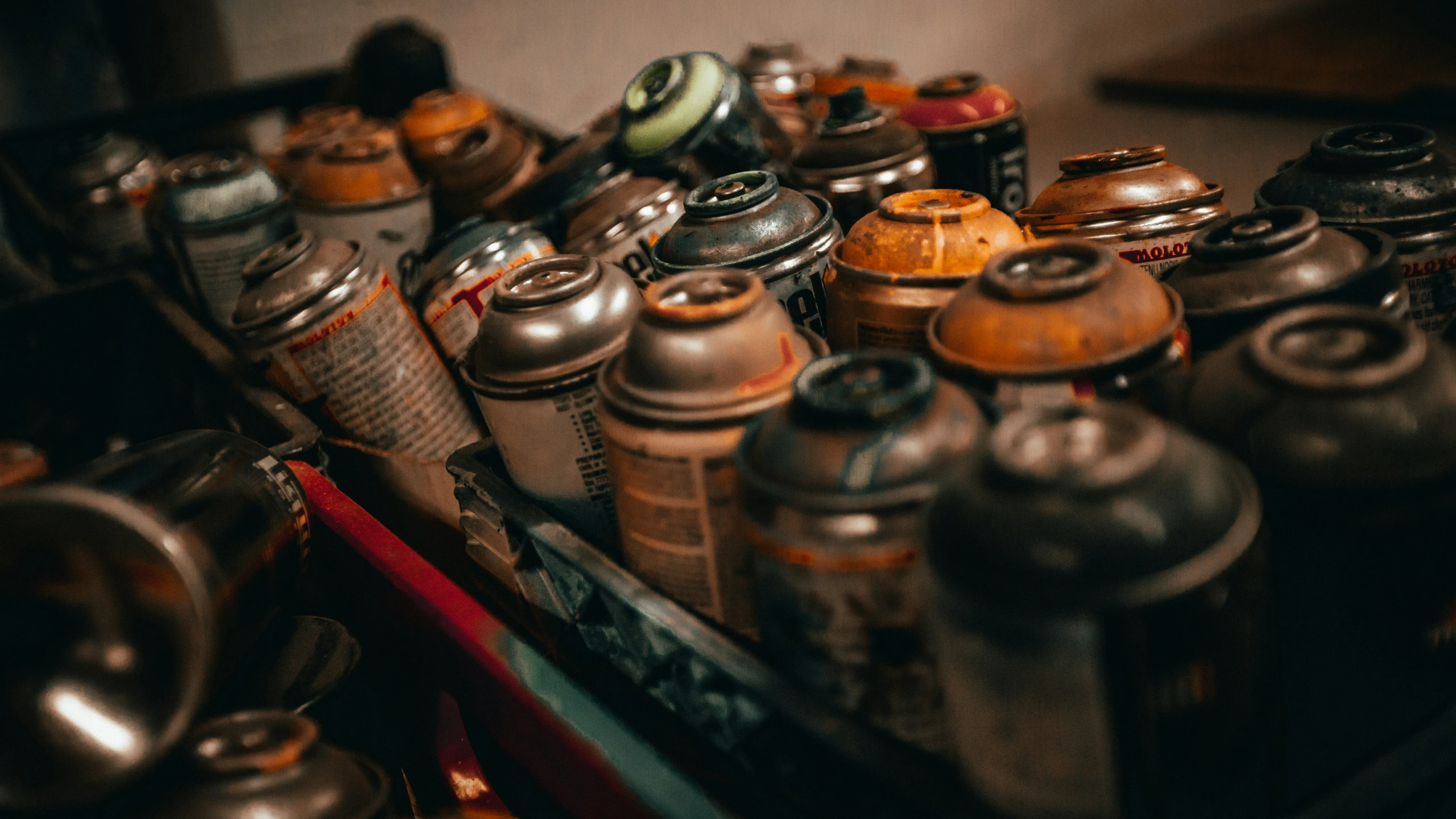 a table that has many different kinds of canisters on it