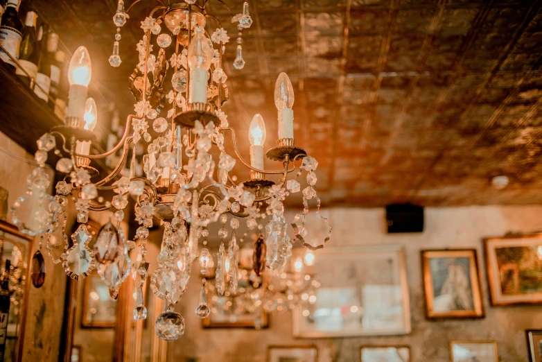 an elegant chandelier hangs from a ceiling