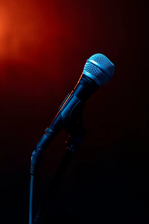 a closeup of a microphone on a stage