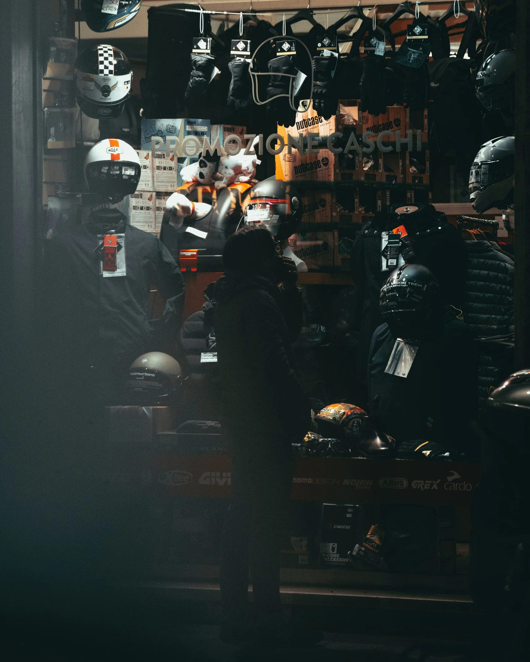 a store display filled with lots of helmets