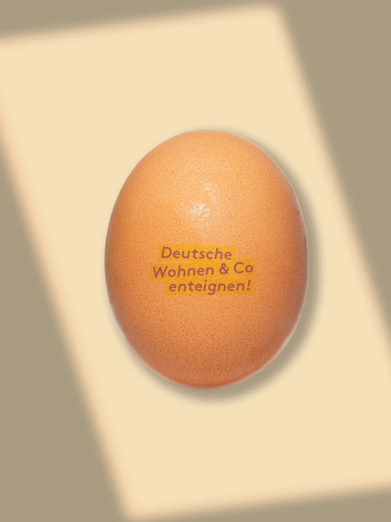 an egg that is on the side of a square
