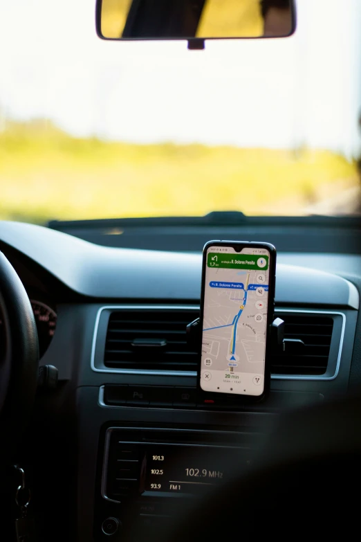 the car dashboard with a map in the middle