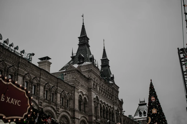 an image of a building in the middle of christmas time