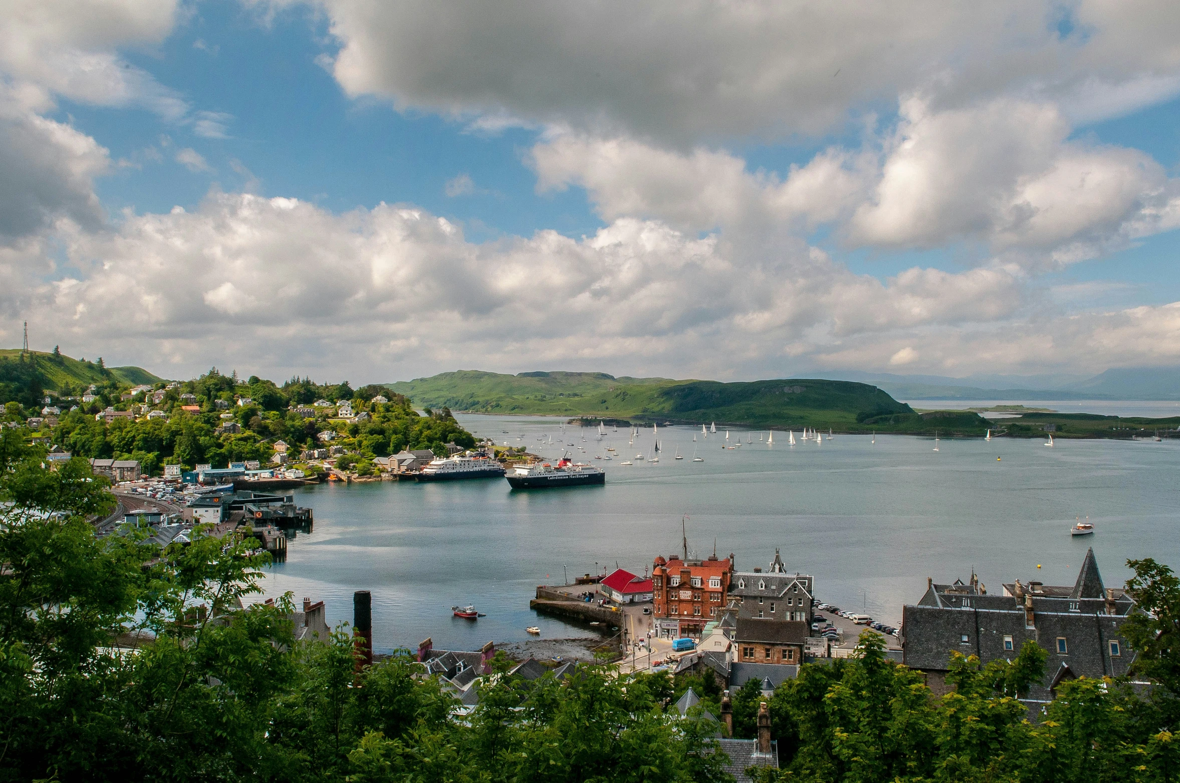 an aerial view of boats docked at the dock