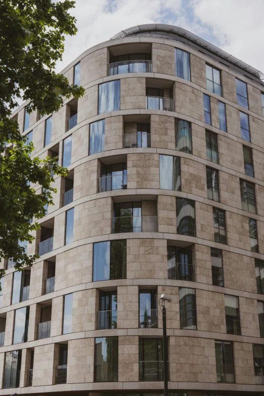 a modern brick building with lots of windows