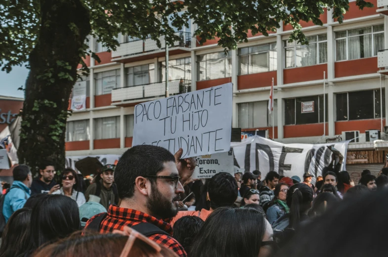 an image of a protest outside of a building