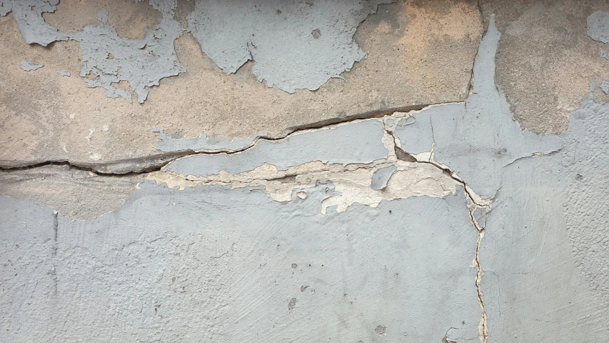  in concrete wall with small s, possibly a  in a wall