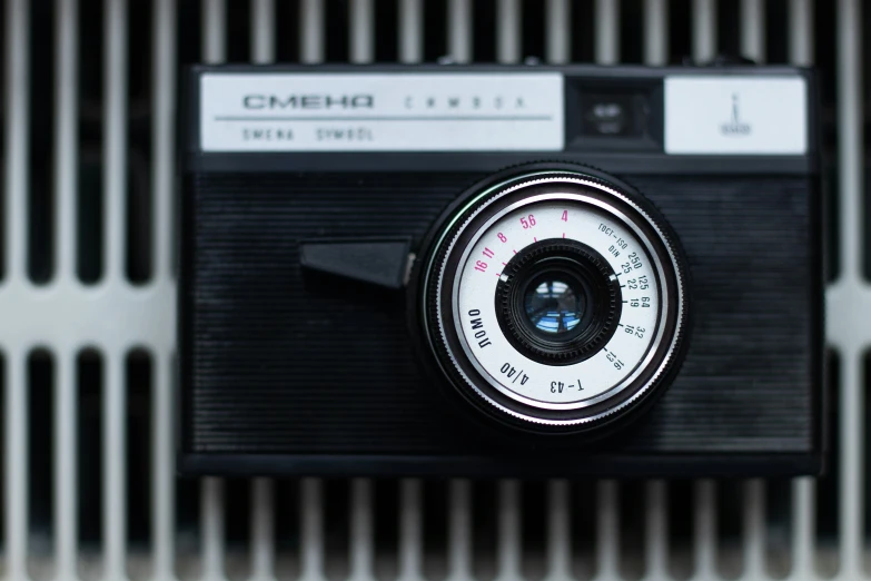 a camera is in the middle of a metal object