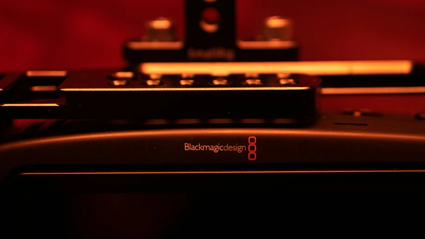 an analog radio sitting on a black table