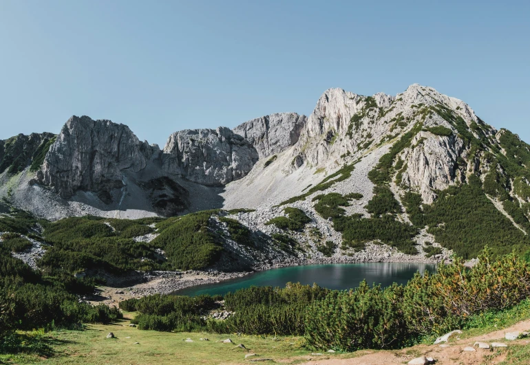 a view of a mountain and a lake in the middle of it