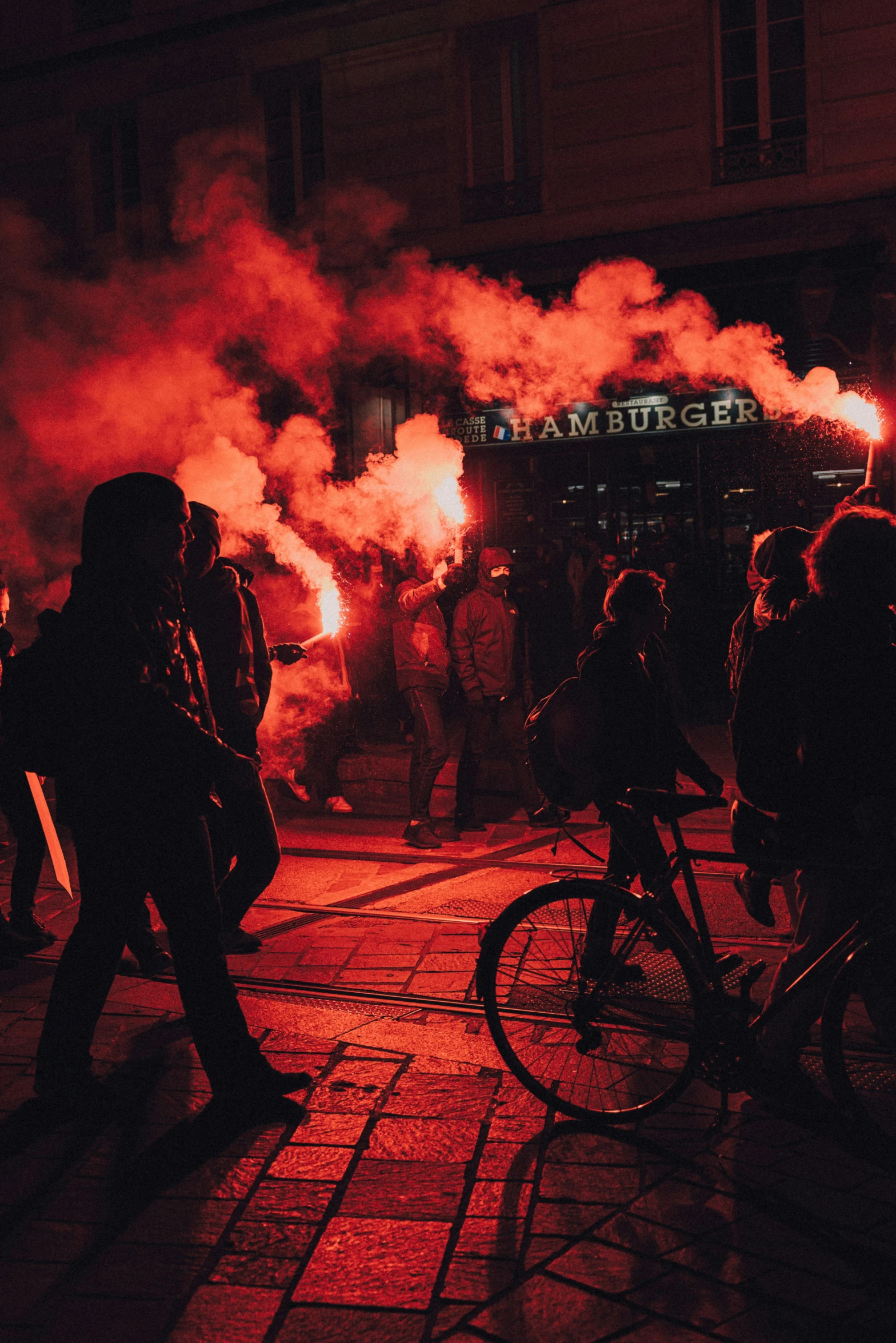 a person on a bike surrounded by lights