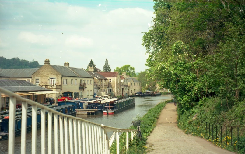 a river runs through some small city streets