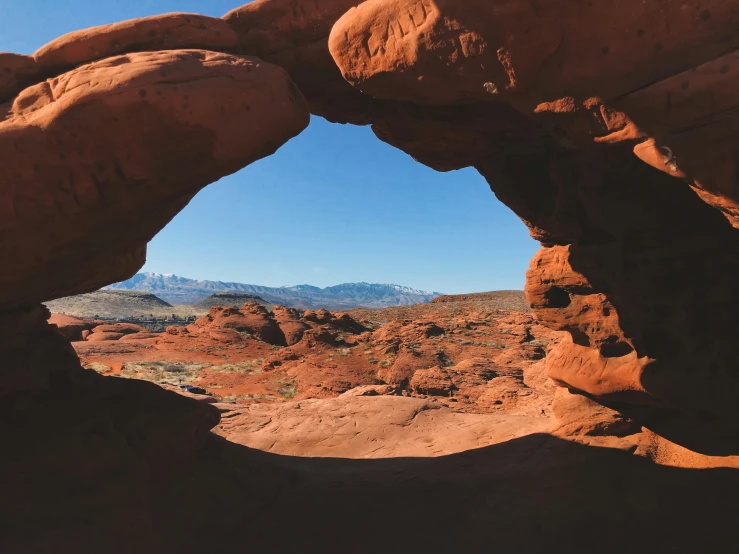 a rocky mountain range in a desert with rocks and other arid terrain