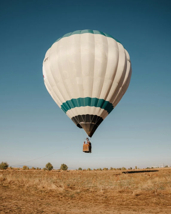 a  air balloon in the middle of a desert