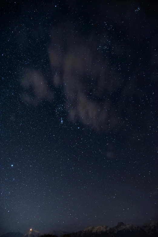 some very pretty stars and the sky filled with clouds