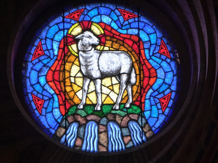 the painting on the stained glass depicts a lamb