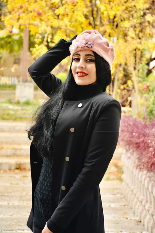 woman wearing a hat in the autumn outside