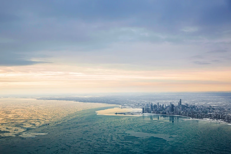 a picture taken from an airplane looking over the water