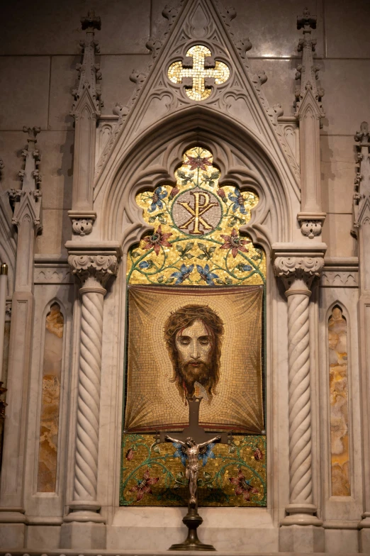 a very elaborate and fancy church with artwork on the back wall