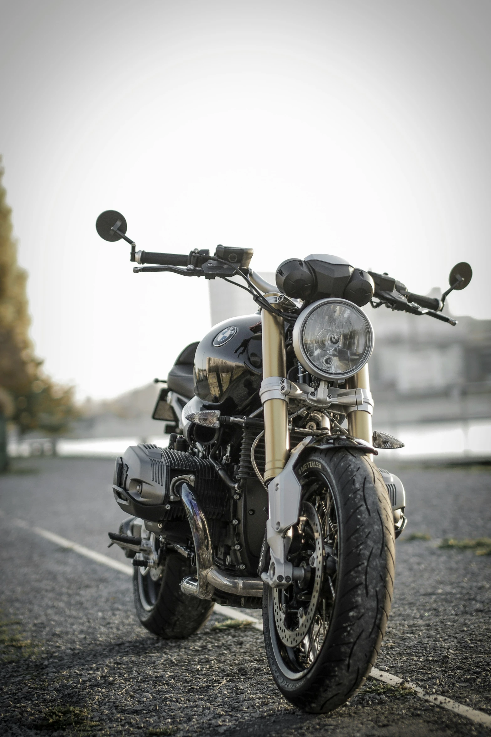 there is a parked motorcycle on the street