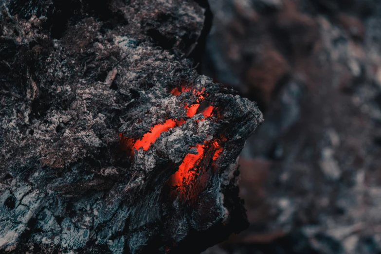 a lava rock with red lighting, as seen from above