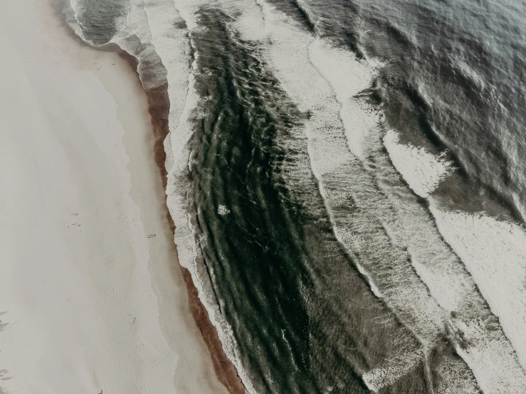 an aerial view of the beach and shorelines