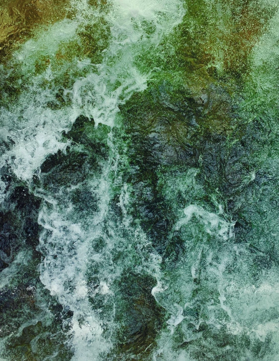 green paint and rough water with black and white highlights