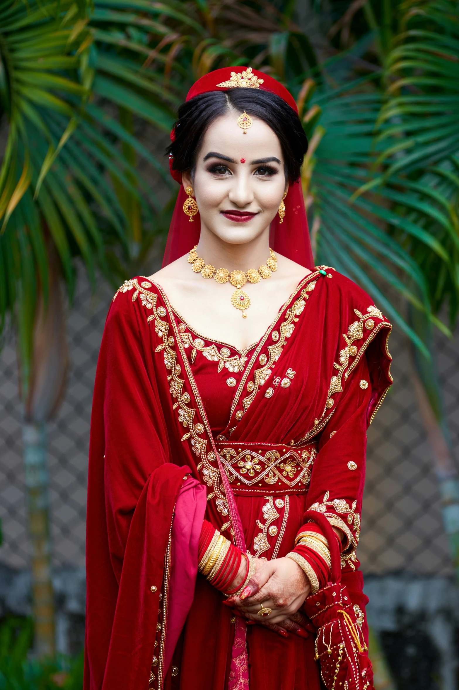 a person dressed in red and gold wearing a costume