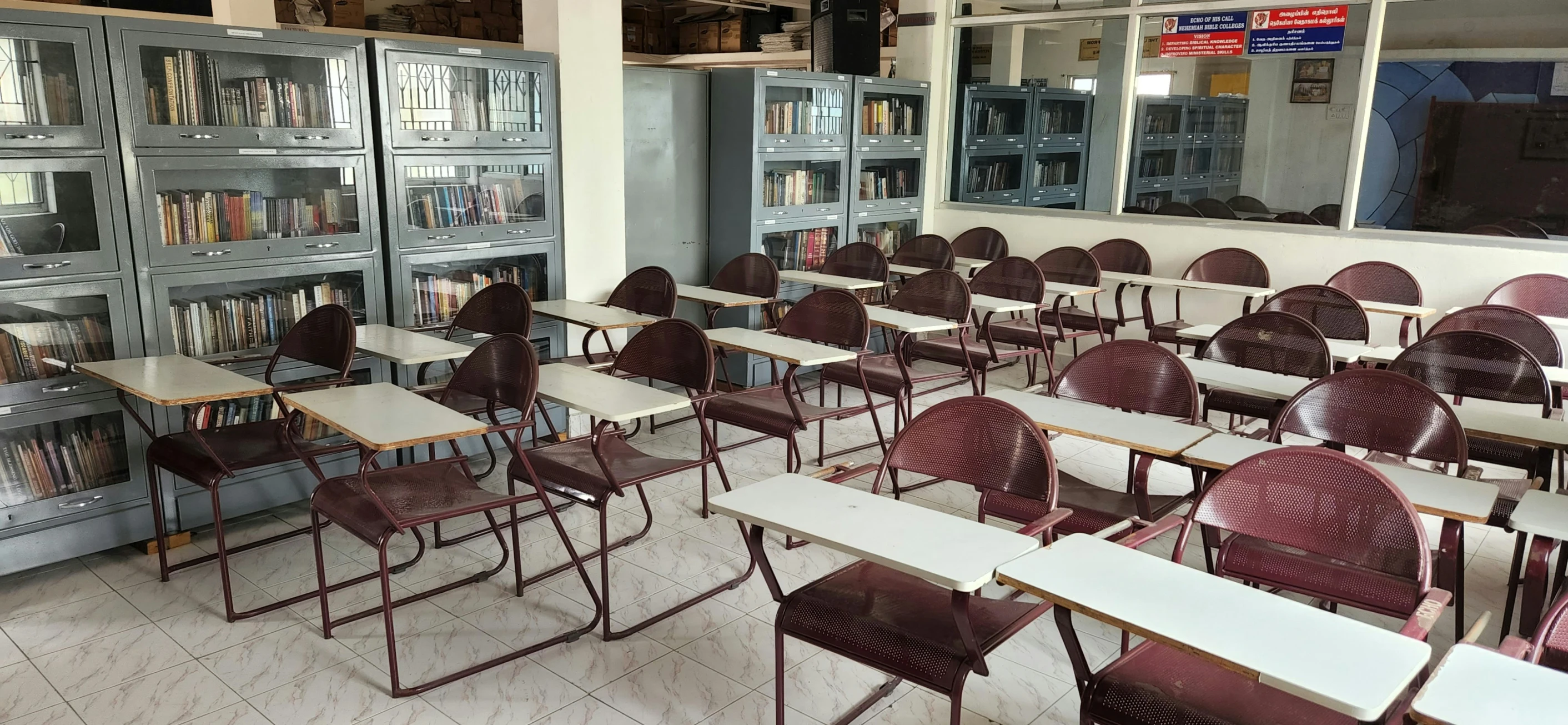 a classroom with a lot of chairs and tables