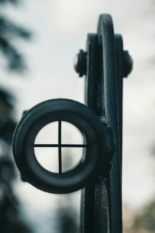 a close up po of a metal object with two circles