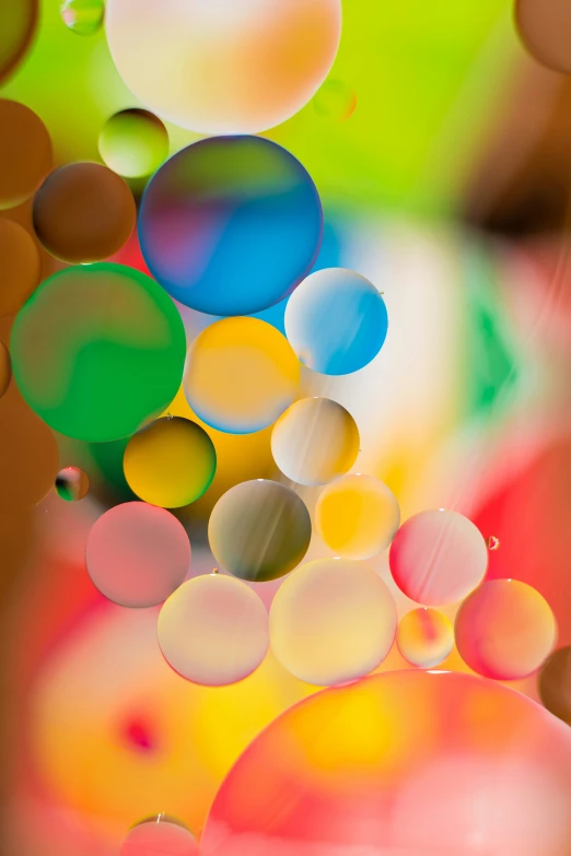 a close up image of a multi - colored background of bubbles